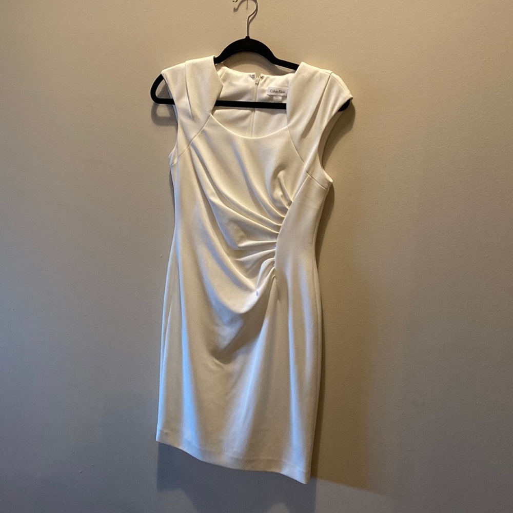 A very beautifully elegant Calvin Klein dress, size 4.